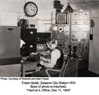Frank Heath at operating station, VEA, Dawson, 1923